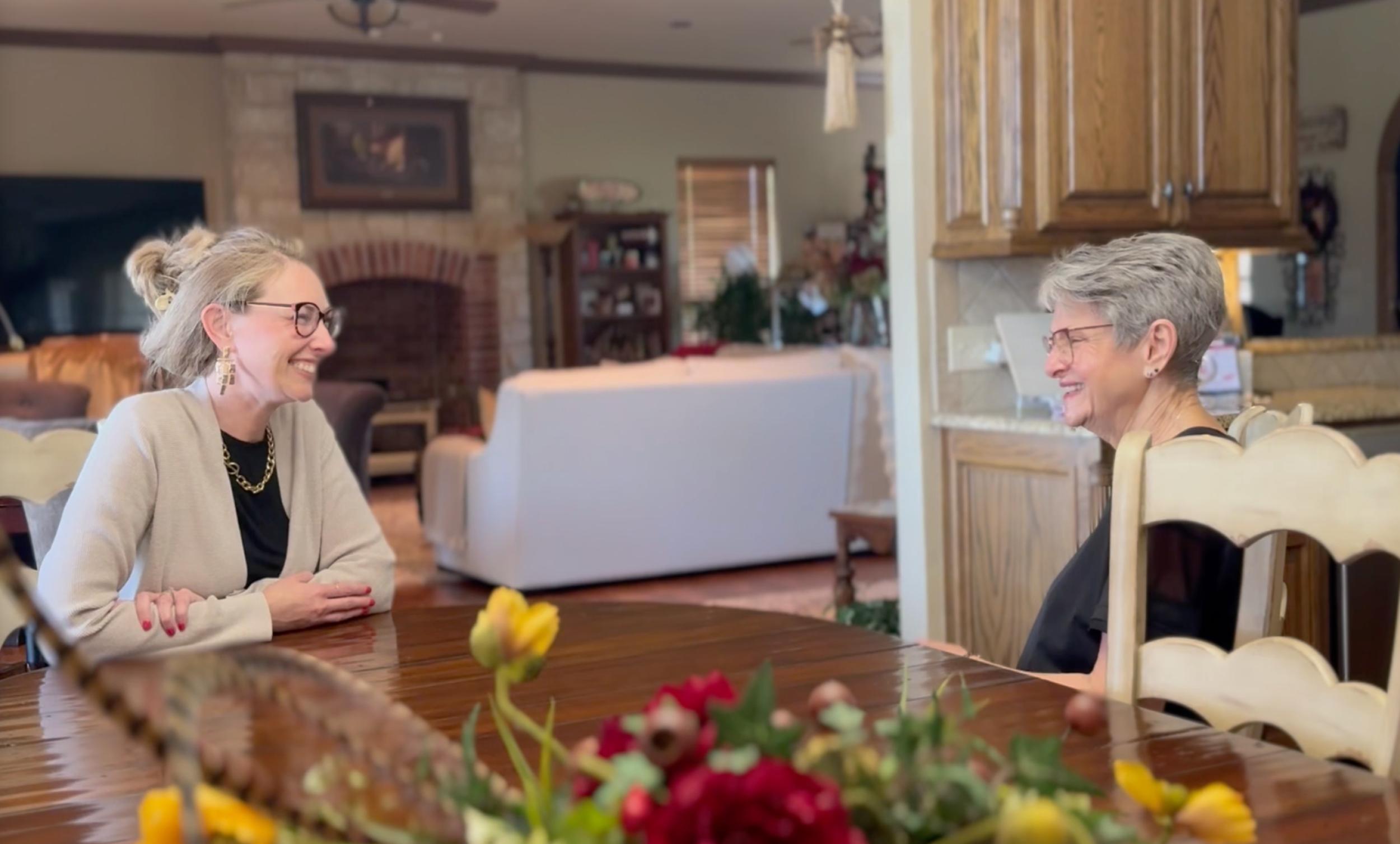 Becky Seda assisting a senior client in Oklahoma City